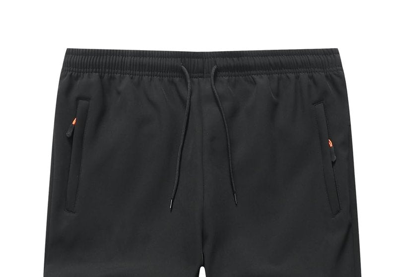 ZooYung Boys Girls Fleece Lined Warm Joggers Pants Water Resistant Waisted Thermal Winter Sweatpants Running Hiking with Zipper Pockets(13822Black10)