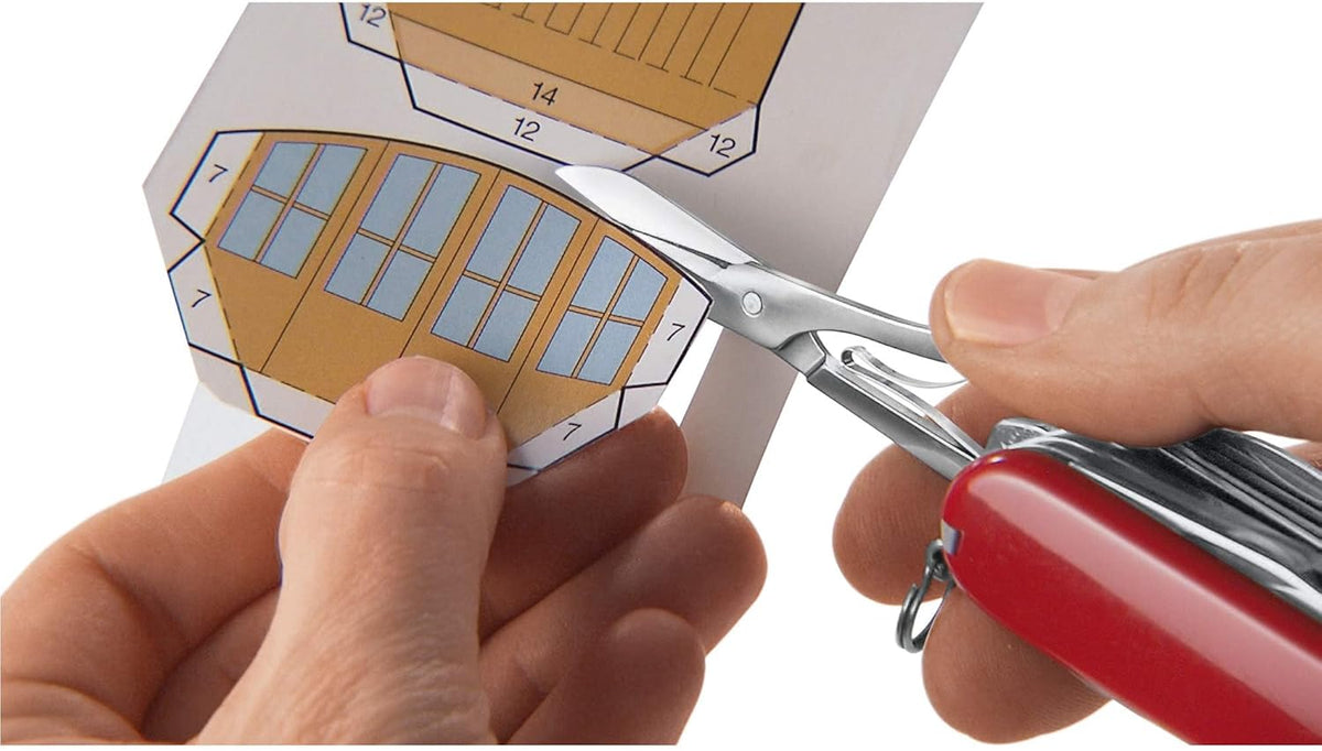 Victorinox Nail Clip 580 Multi-Tool - 8 Functions, Swiss Made with Nail File & Cleaner - Ruby