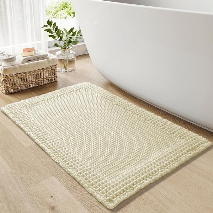 RESARE Waffle Bath Mat for Bathroom, Super Absorbent Bathroom Rugs Non Slip Machine Washable, Ultra Soft Quick Dry Boho Bath Rugs with Tassels for Floor, Upgraded Bordered Design, 17"x24" Cream
