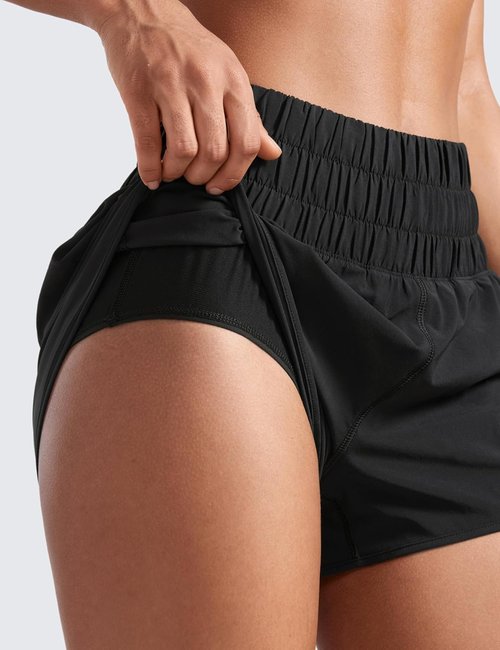 CRZ YOGA High Waisted Dolphin Running Shorts - Mesh Liner & Zipper Pocket for Women’s Gym Workouts